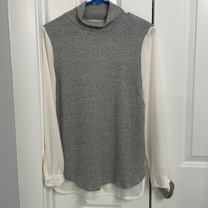 Loft Size XS Blouse. Knit front and polyester sleeves and back.